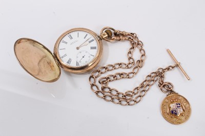 Lot 727 - Edwardian 9ct rose gold watch chain with gold and enamel Bury Athletic Club medal, together with a Waltham gold plated pocket watch