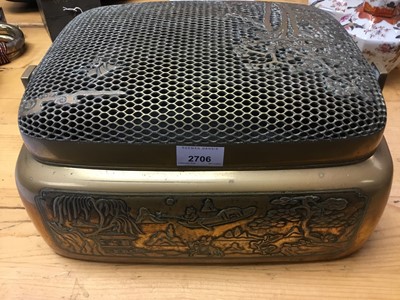 Lot 2706 - Late 19th century Chinese brass carriage warmer with ornate pierced cover and cast landscape decoration with swing carrying handle 40 cm wide