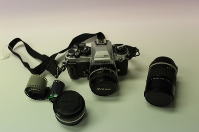 Lot 2719 - Nikon FA 35mm SLR camera with three Nikon Series E lenses: 28mm f/2.8, 50mm f/1.8 and 135mm f/2.8