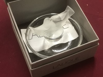 Lot 1320 - Lalique frosted glass paperweight, with engraved and printed label, doves on dished base, boxed