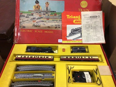 Lot 1874 - Tri-ang RAX train set, boxed x2, suitcase containing various boxed carriages, rolling stock and accessories, plus a selection of track.