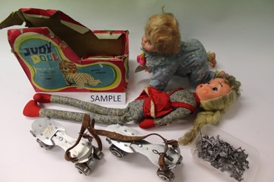 Lot 1882 - Suitcase of children's toys to include Judy doll, radio controlled car and other toys