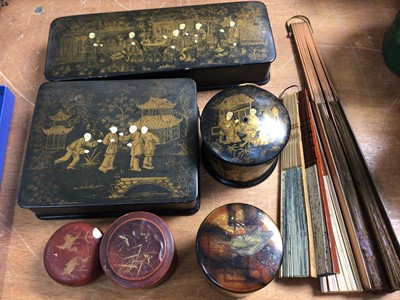 Lot 425 - Two Japanese papier-mâché boxes and string box, three other containers and four fans