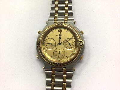 Lot 674 - Gucci stainless steel bi-metal wristwatch in box