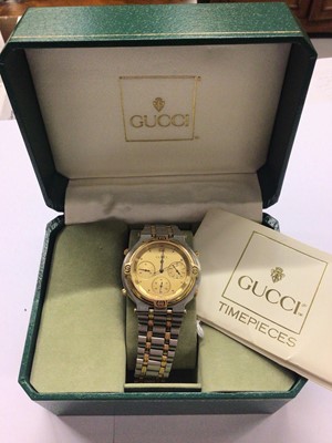Lot 674 - Gucci stainless steel bi-metal wristwatch in box